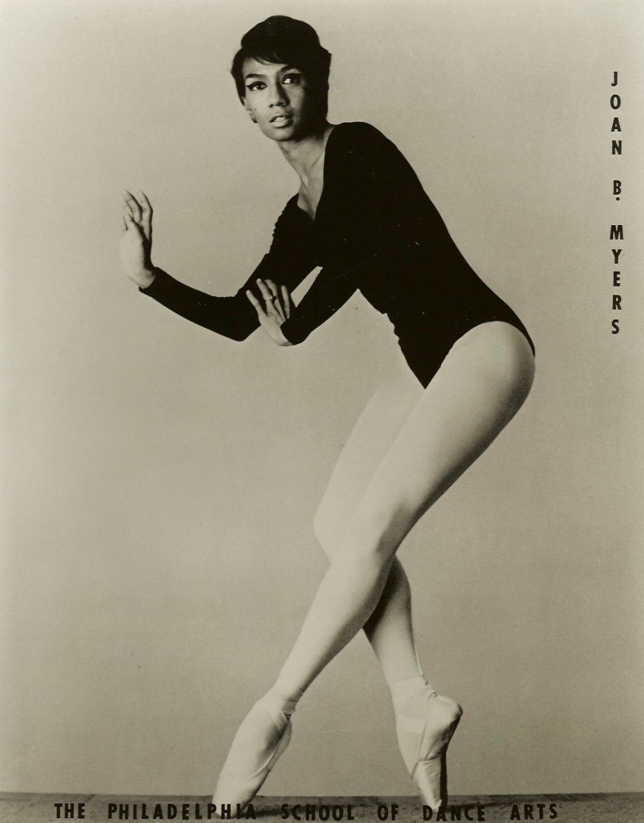 A picture of a Young Joan Myers Brown on pointe wearing a black leotard and light-colored tights